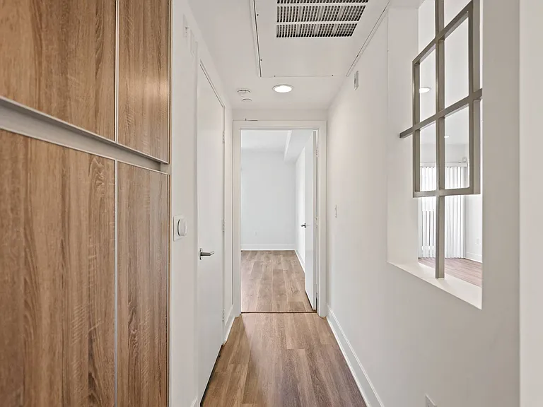 Hallway with Built-In Cabinet Storage