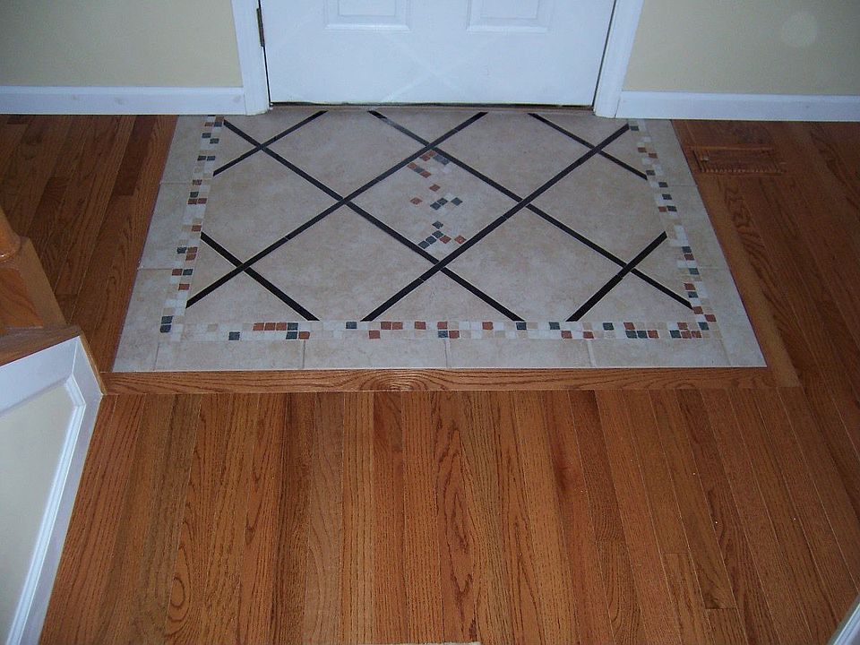 Foyer - tile & wood floor