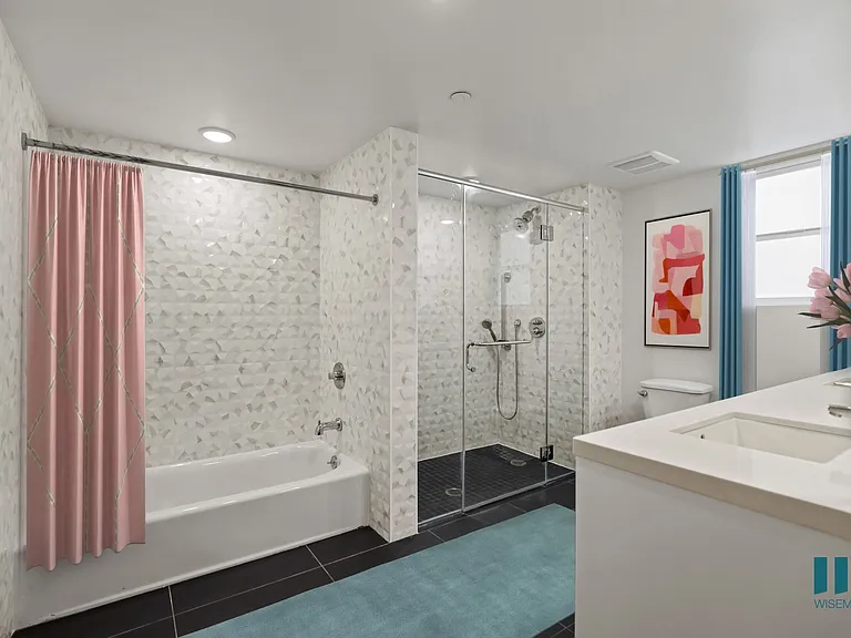 Large-Size Bathroom with a Walk-In Shower, Bathtub, and Double-Sink Vanity