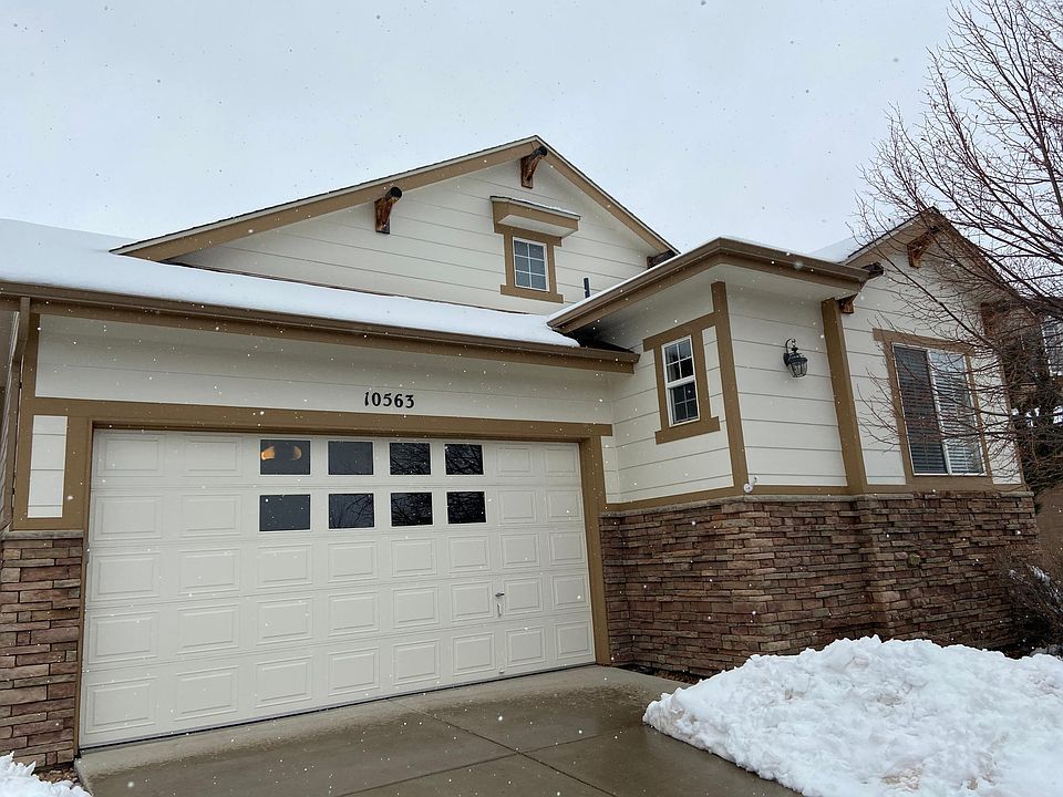 Spacious 2-car garage with windows.
