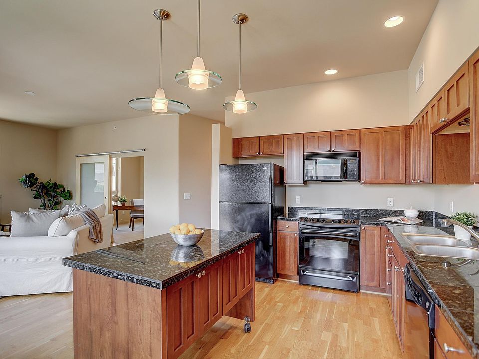Spacious and elegant open plan living. Cherry cabinet, granite tile countertops and a moveable island for ultimate flexibility.
