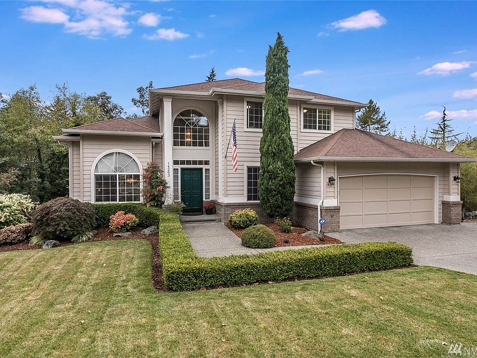 Welcome home to Seahurst! This gorgeous 4 bed/ 4 bath home was custom built by this original owner and has been immaculately maintained.  Situated at the entrance to Seahurst park, revel in long sunset walks along the glorious Puget Sound. Enter to soaring ceilings and gleaming hardwood floors that sweep through to the kitchen. The spacious circular floorplan lends itself perfectly to entertaining. Enjoy walls of windows across the back of the home looking out to the .3 acre property which backs to the lush Seahurst Park greenbelt. Upstairs delight in your master suite which feels like a retreat with a private deck overlooking the back yard & greenbelt. The master bath has been updated with a spa-like walk-in shower, heated travertine floors, granite topped vanity & walk-in closet.  Downstairs find a fully finished 2nd family room, wet bar, full bath, separate indoor shop/workbench (see mother-in-law potential) and access to a full-length covered patio. 