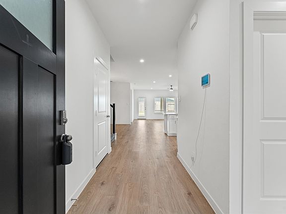 Long entryway with smart panel system.