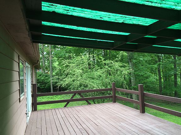 Large Deck, partially covered, access from small bedroom only