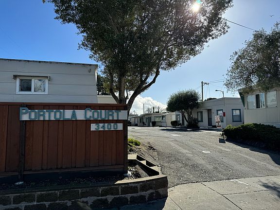 Front view of Portola Court park from Portola Drive