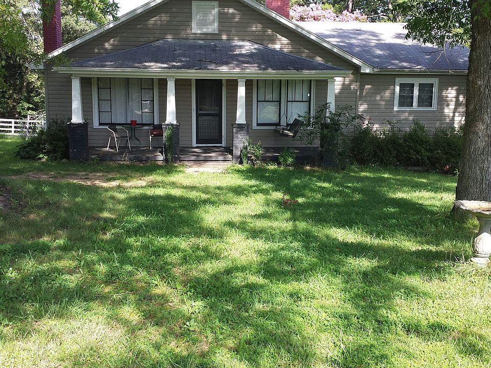 Country Living/City Convenience with almost 6 acres.