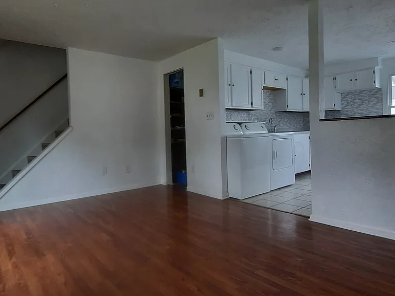 living room area with small storage closet