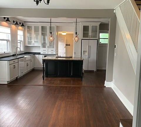 Large living room and open kitchen with island