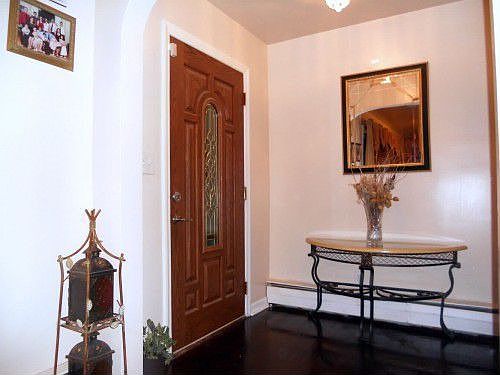 Replaced entryway door and lighting accent is impressive.