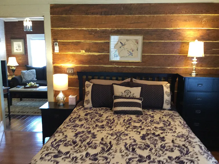 A charming second bedroom with private bath provides comfort and flexibility for longer stays.