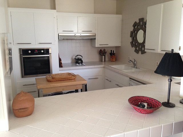 Kitchen looking through open concept bar countertop