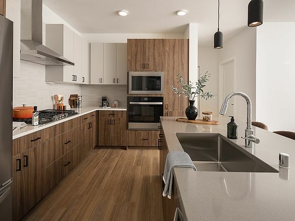 Experience culinary bliss in this contemporary kitchen, featuring top-notch finishes and design.