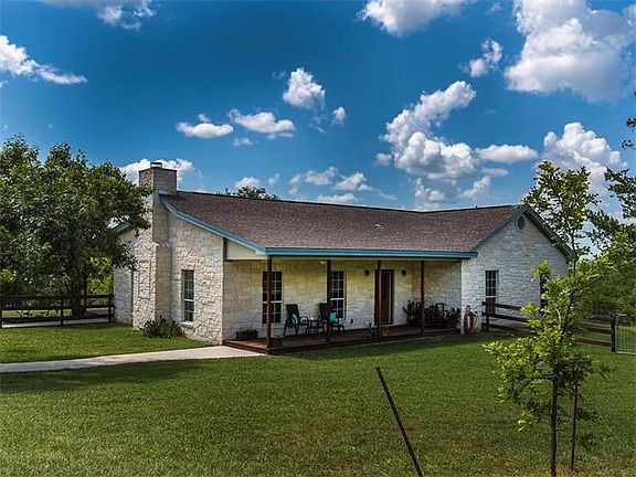 The curb appeal of the stone exterior only hints at the quality materials used to build and add style to this custom home.