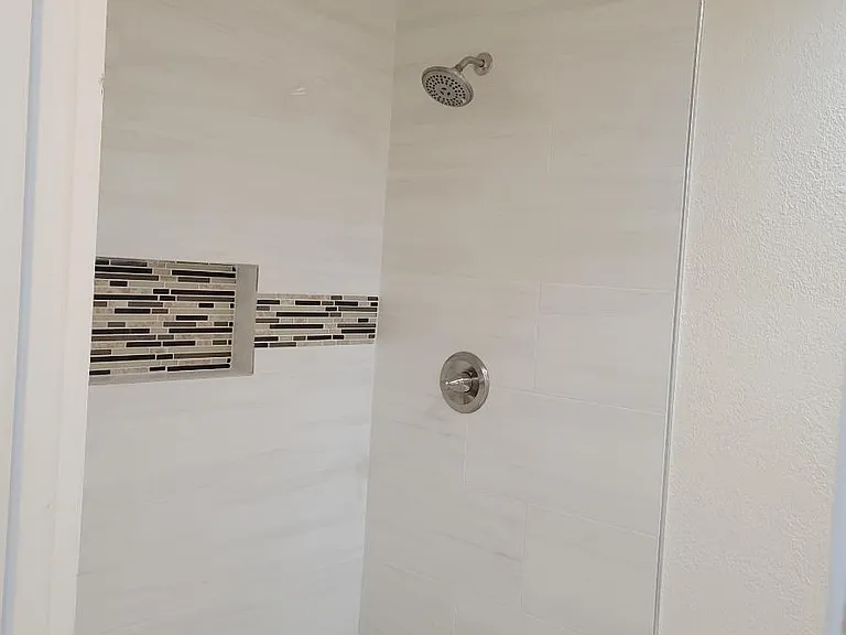 Master bedroom walk in shower with double vanity
