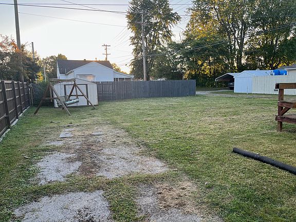 Backyard covered porch and shed