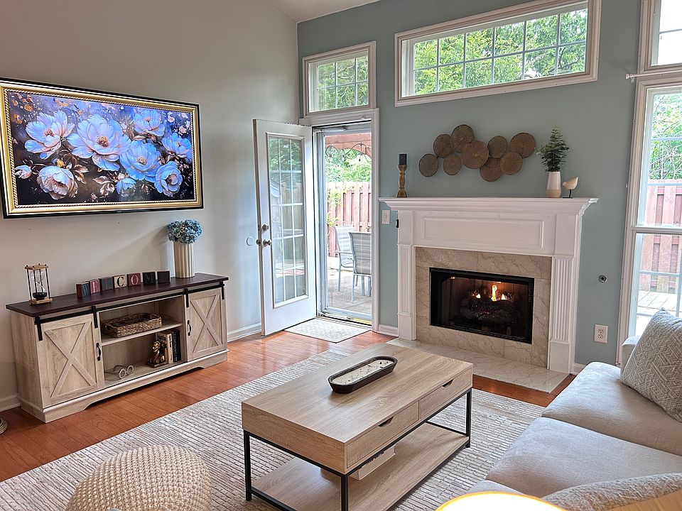 65" smart tv, highly end furnishings, airy and warm living area