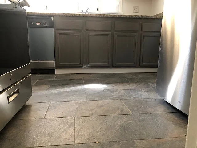 KITCHEN FLOOR AND CABINETS