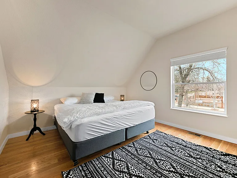 west bedroom with king bed and large closet