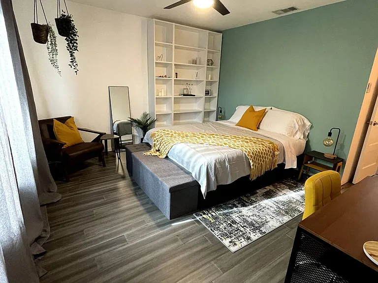 shown with queen bed and desk setup
