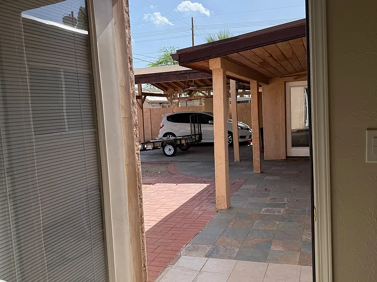 Main Bedroom private entrance looking to the backyard and garage