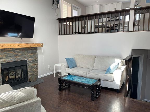 Walking in to living room. This is a split level home.