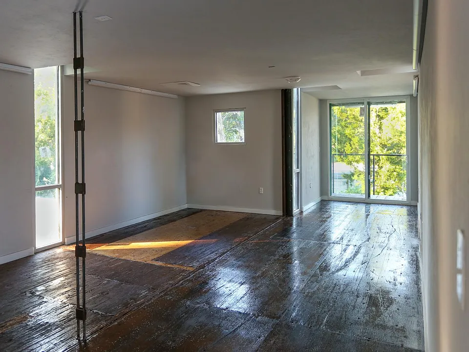 Interior of upstairs shipping container office with balcony. $1000/mo