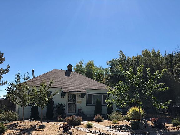 Bungalow Style Home with Large Landscaped Front Yard.