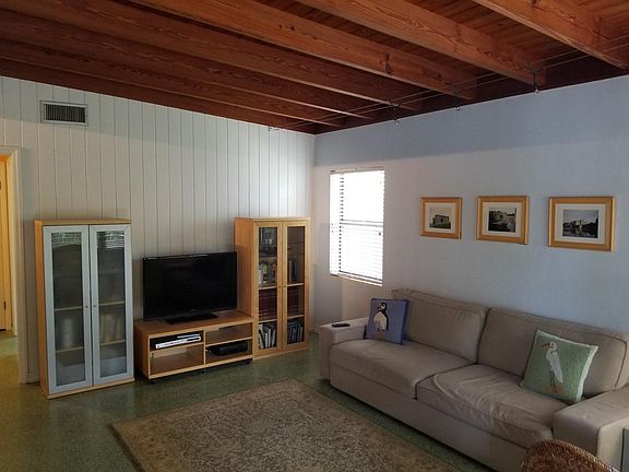 Living Room 8 - 12 foot exposed tongue and groove ceiling