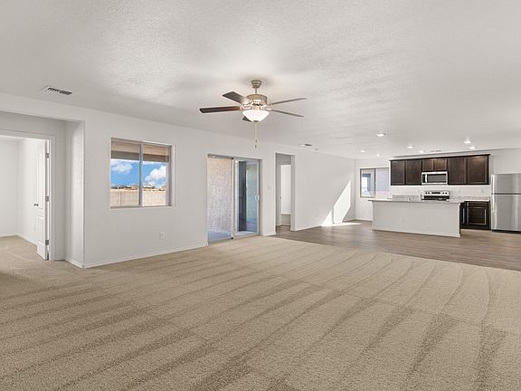 Open-concept layout allows easy transition from cooking, to eating, to resting in the living room.