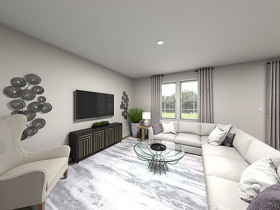 Great room in the Lakeland floorplan at Meritage Homes.