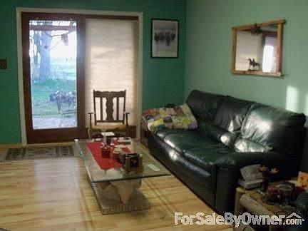 living room
						:
						new light oak laminite floors fresh paint