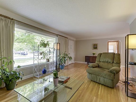 Coved ceilings, hardwood floors, fresh paint throughout the home.  Move in and enjoy!