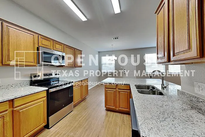 7908 Swan Park Dr — Photo 6