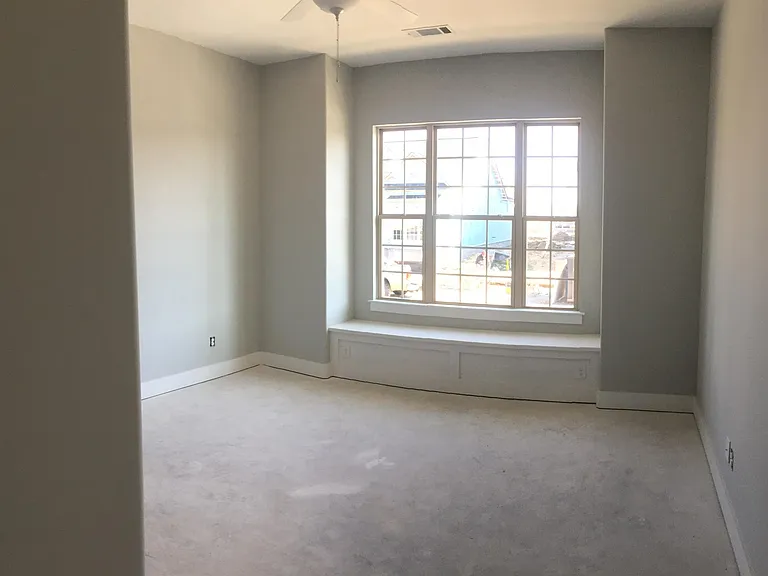 Downstairs/Front Bedroom - A Full Bath is shared by this Bedroom and a Matching Size Bedroom