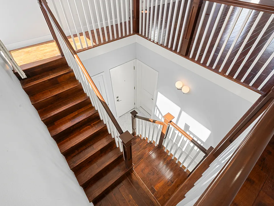 Entryway with stairs to main floor