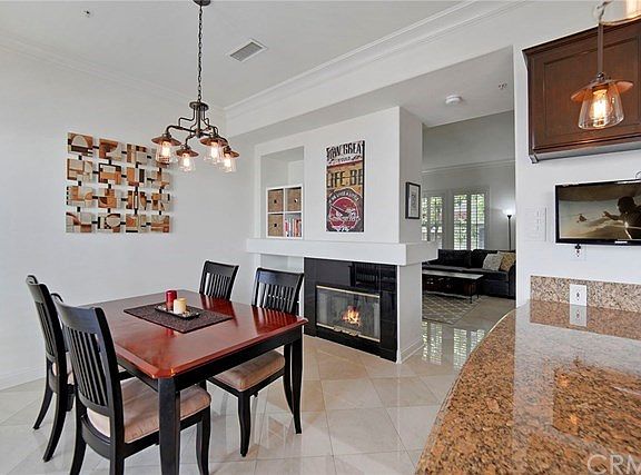 Dual fireplace in the Dining Room & Living Room