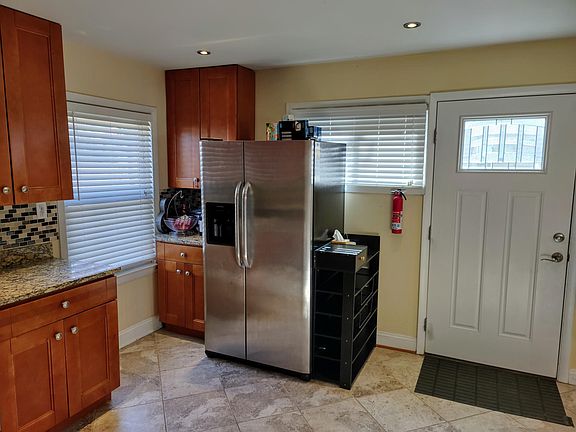Kitchen Facing Entry Door and Front Yard
