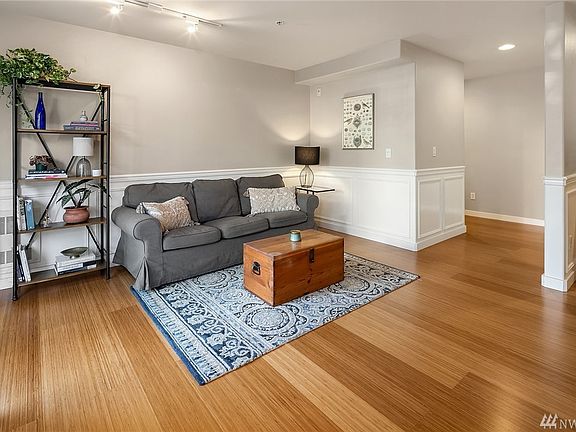 You'll appreciate the light neutral colors and beautiful detailing iof wainscoting and chair rail.