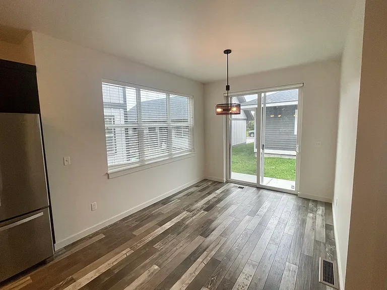 Dining room with sliding doors to backyard