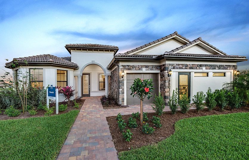 The Pinnacle, a single-story family home with a 3 car garage, shown with Home Exterior FM2B