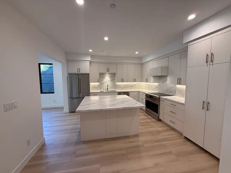 Massive chef's kitchen with luxury appliances