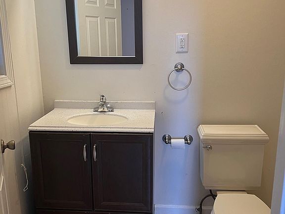 bathroom with bath and shower head