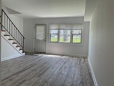 Living room and stairway to second floor