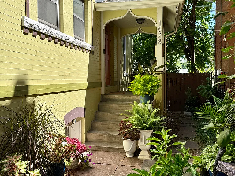 PRIVATE Entrance (side of building) with flagstone terrace