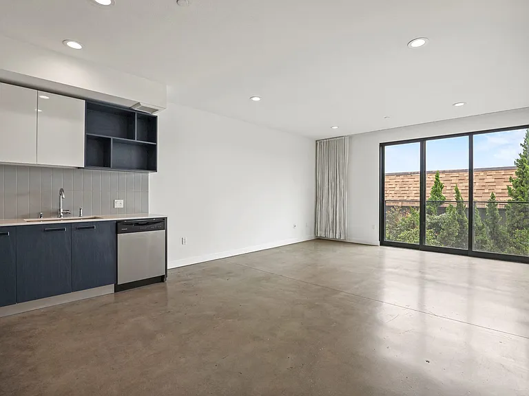 Open-Concept Kitchen, Dining, and Living Room Areas