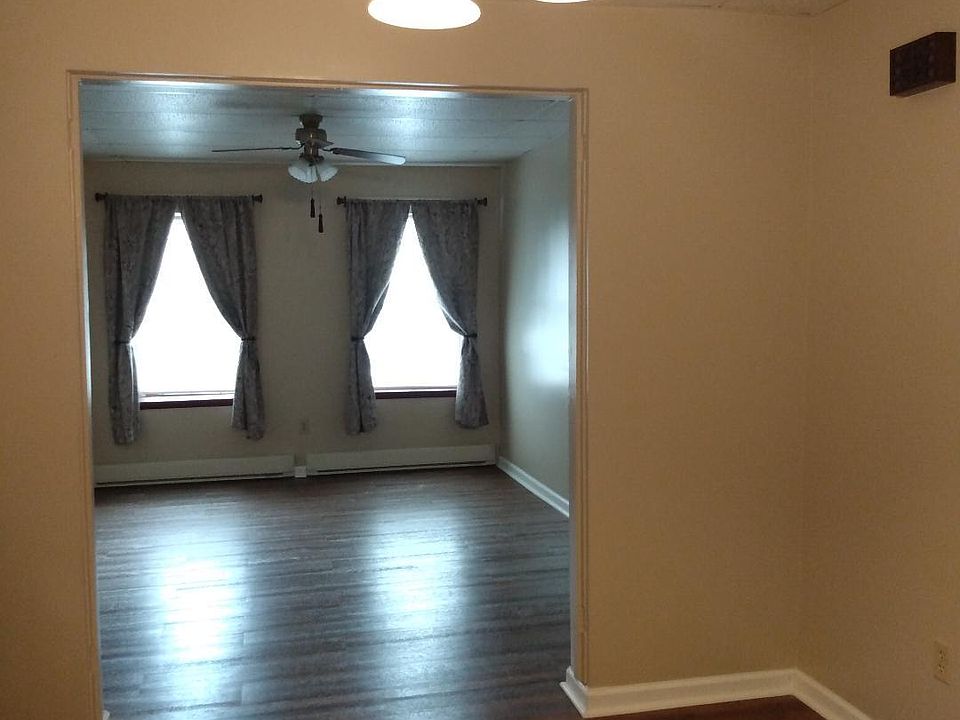 Dining room into Living room, hardwood floors.