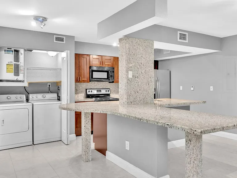 2881 N Oakland Forest Dr #105 — Photo 10