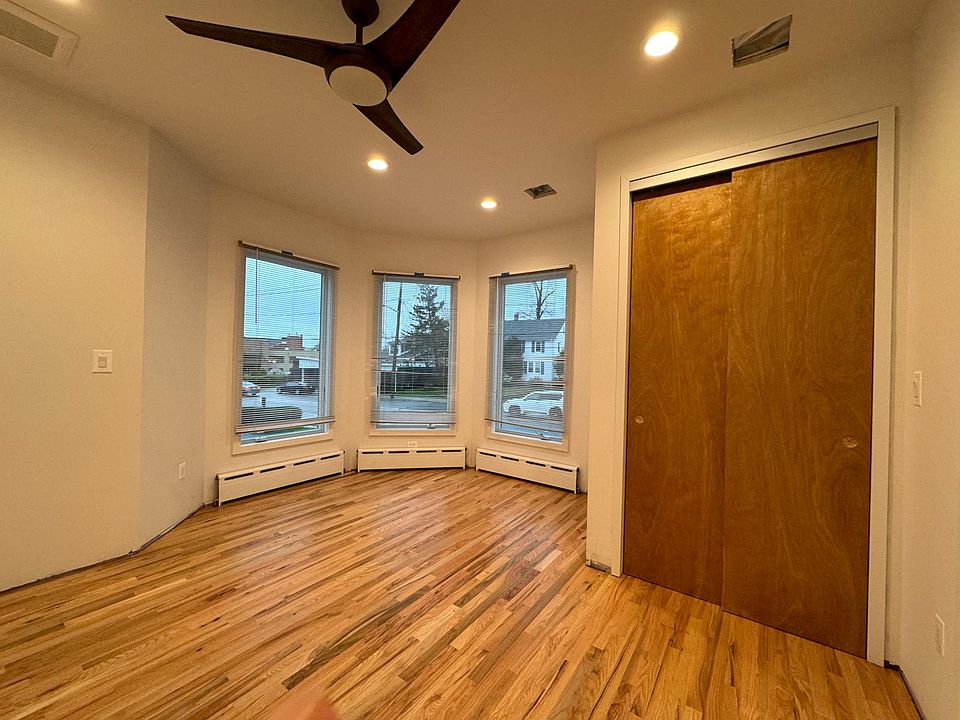 Bedroom, large closet with cedar shelves and cast iron baseboards