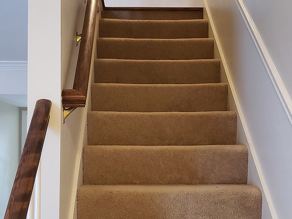 Only the stairs are carpeted to reduce noise and increase safety.