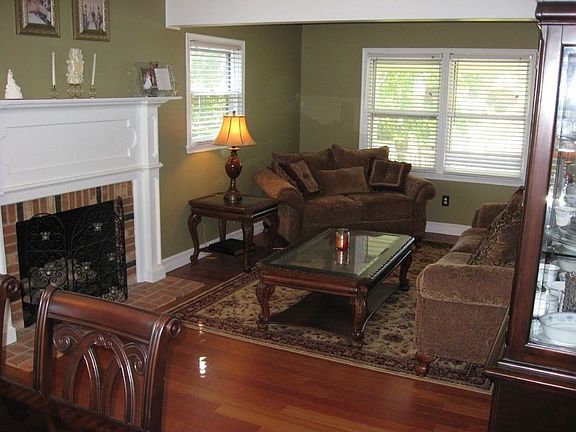 View of living room w/ gas fire place